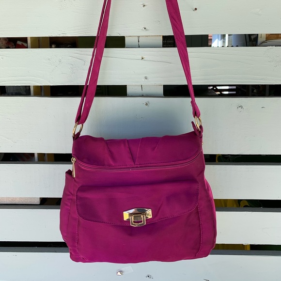 Travelon Handbags - Travelon Pink travel on shoulder bag